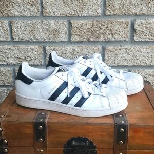 Adidas Superstar, size 8 men's, 9.5 women's.